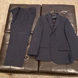 Boys navy blue Ralph Lauren suit.  Jacket size is 10R and pants are 25–“ W